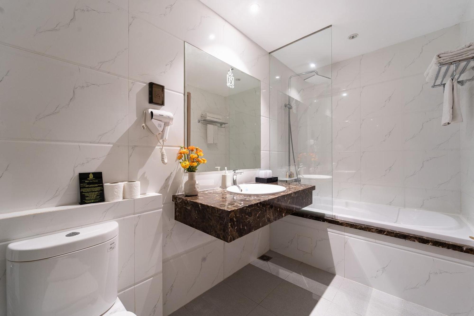 Nicecy Hotel Suites & Spa Хошимін Номер фото