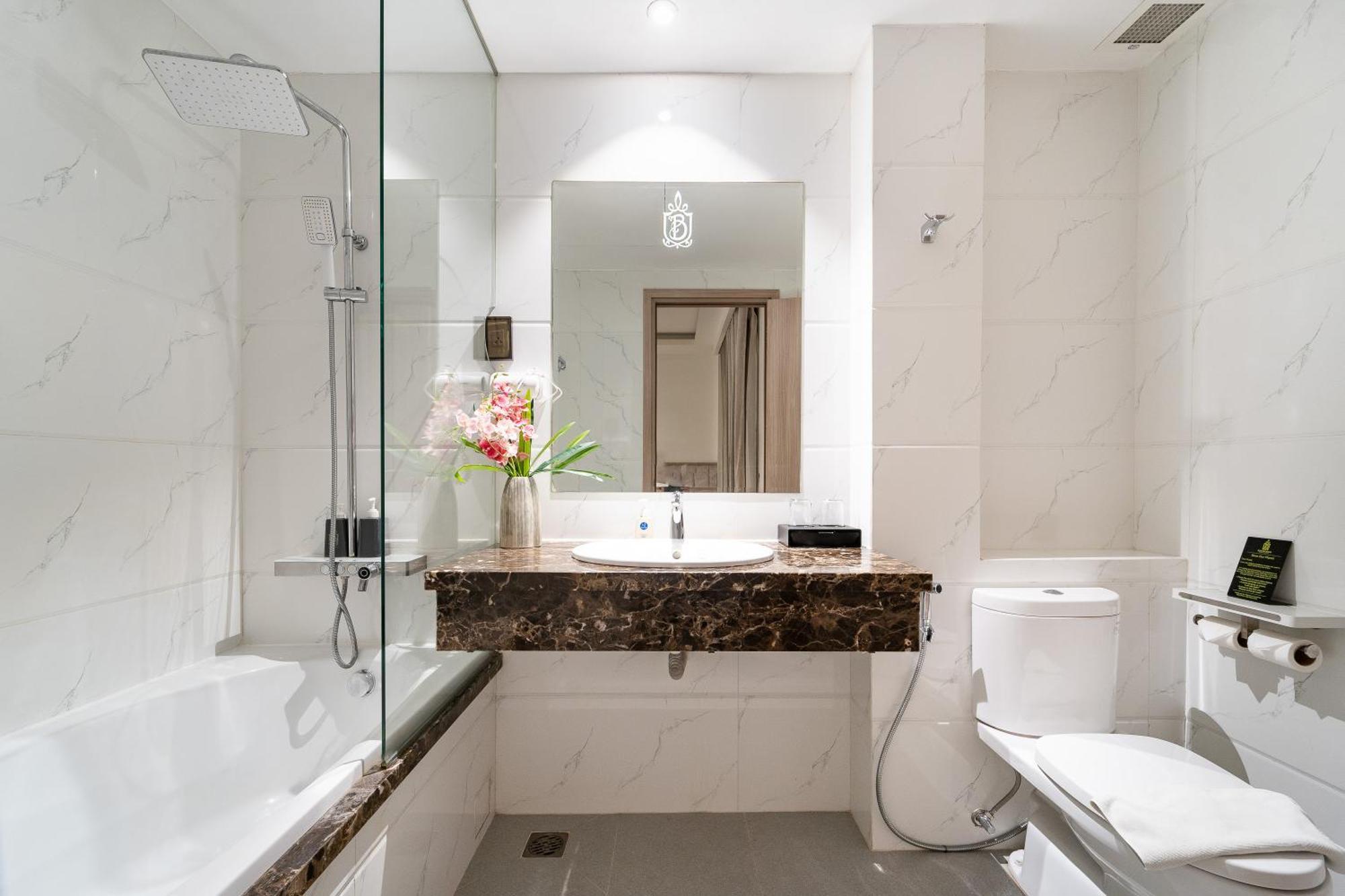 Nicecy Hotel Suites & Spa Хошимін Номер фото
