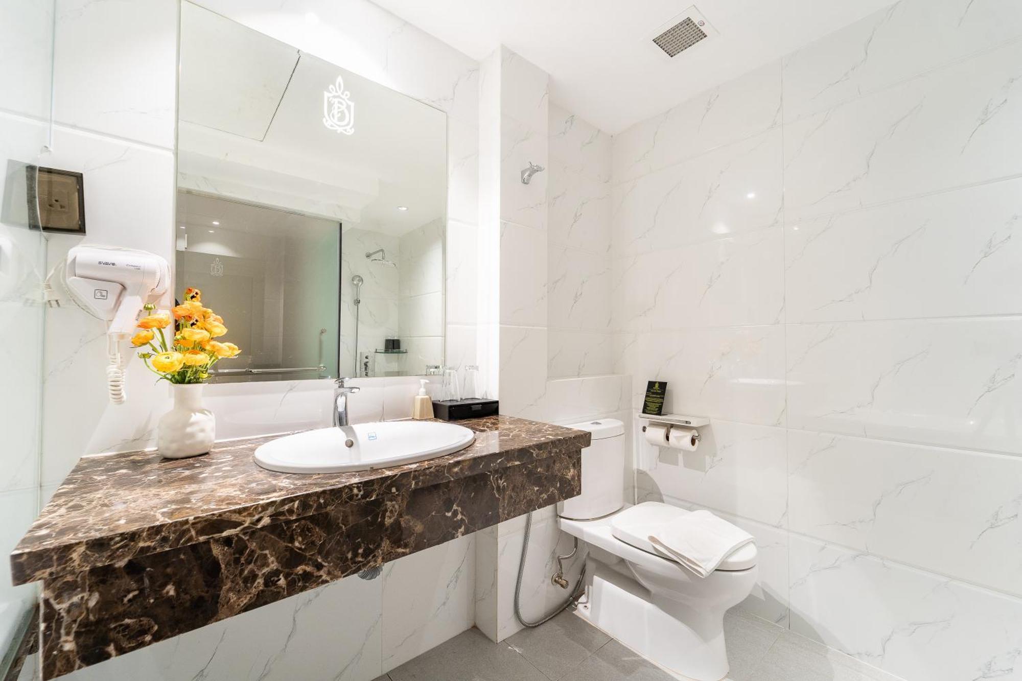 Nicecy Hotel Suites & Spa Хошимін Номер фото